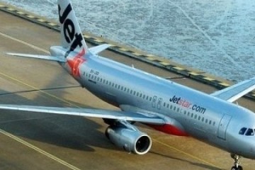 a plane sitting on top of a runway