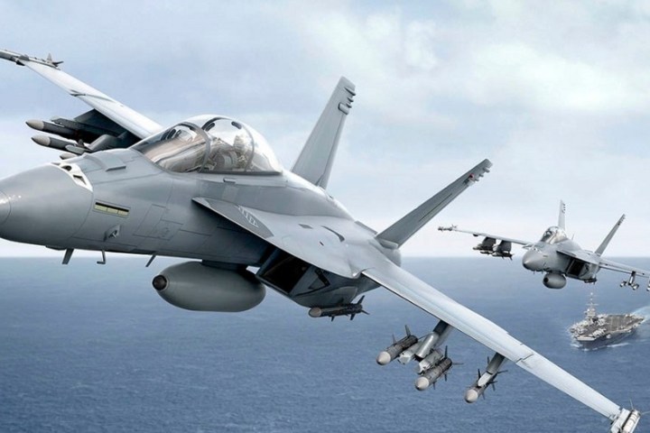 a plane flying over a body of water