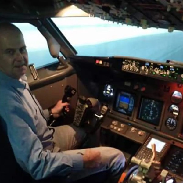 a person standing in front of a car window