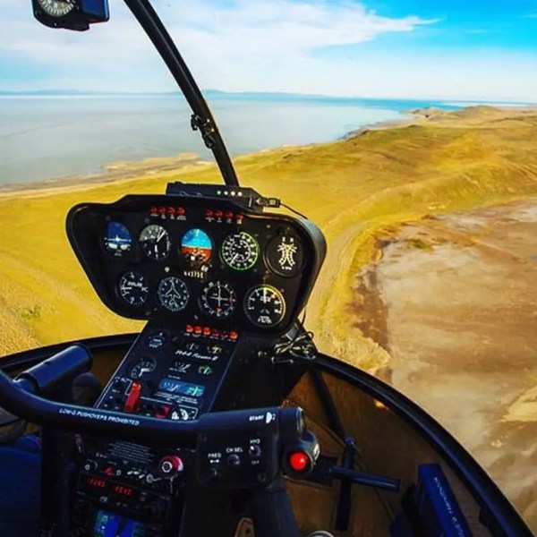 a person driving a boat in the water