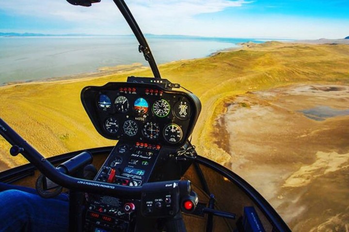 a person driving a boat in the water