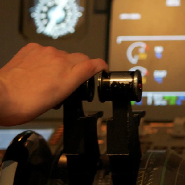 a man holding a keyboard